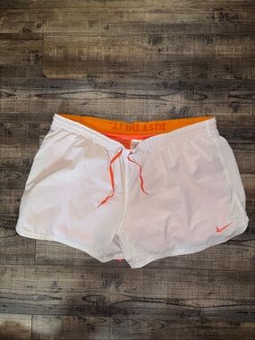 Nike White Women's Athletic Shorts with Orange Accents